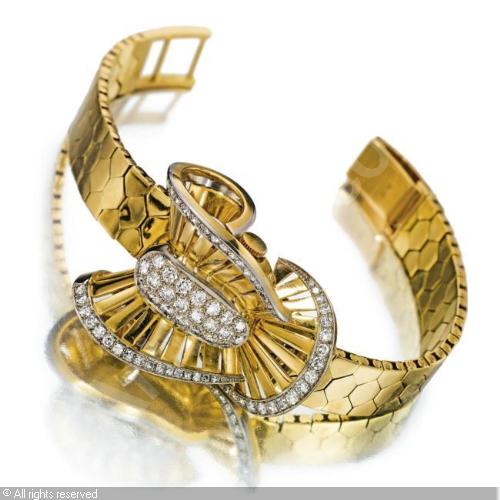 Name:  rolex-switzerland-a-lady-s-gold-diamond-set-brac-2259040.jpg
Views: 329
Size:  33.8 KB